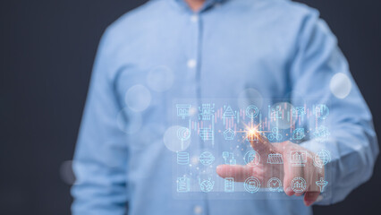 Professional engages with holographic technology, various data-driven icons and charts, symbolizing convergence of innovation, analytics, and advanced digital solutions in modern world