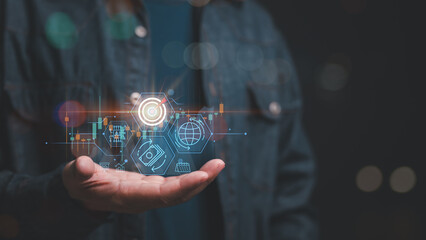 Person holds futuristic digital icons representing technology, finance, and global connectivity,...