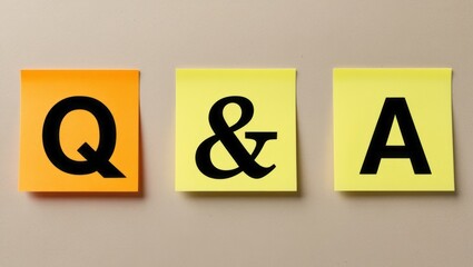 Sticky note with the letters q&a