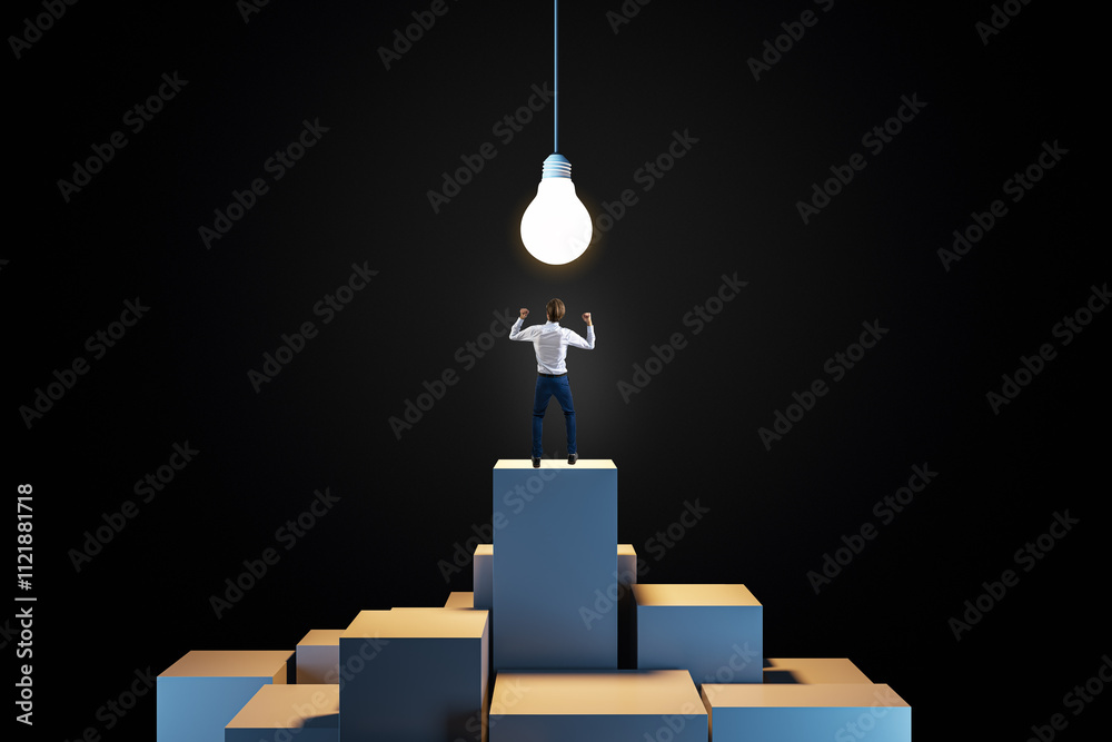 Poster Businessman standing on a stack of blocks under a glowing lightbulb on a dark background.