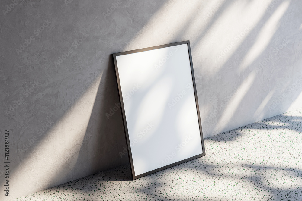 Aufkleber Blank frame standing on terrazzo floor near wall with textured stucco surface, lit by soft light and shadows. Modern artwork display concept. 3D Rendering