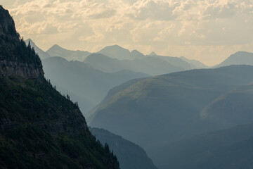 Naklejka premium Silhouetted Layers Of Mountains In Glacier