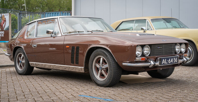 Lelystad, The Netherlands, 16.06.2024, Side view of the vintage grand touring car Jensen Interceptor from 1968 at The National Old timer Day