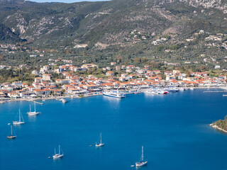 Aerial drone photo of the coastal town and port in Nydri on the island of Lefkada in Greece.