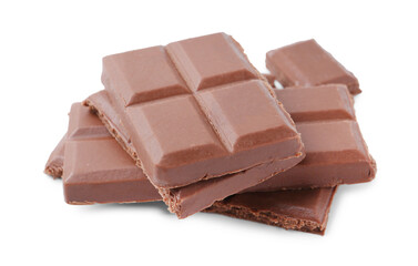 Pieces of delicious milk chocolate isolated on white