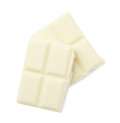 Pieces of delicious white chocolate isolated on white, top view