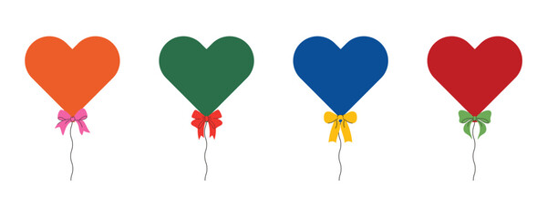 A set of colorful heart-shaped balloons adorned with ribbon bows. © Ira