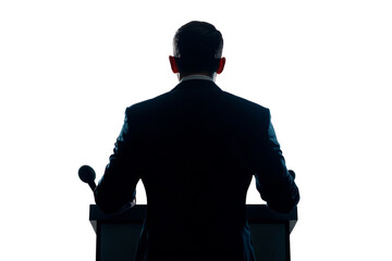 A silhouetted figure of a speaker at a podium, emphasizing the power of public speaking and communication, isolated on a black background.