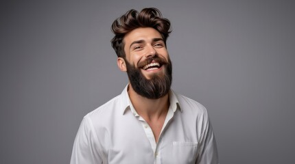 Fototapeta premium Man laughing. Happy smiling young beauty man laughing. Cheerful man laugh guy. Portrait Of Young Handsome Man Smiling. Closeup face of smiling casual guy. Happy male model.