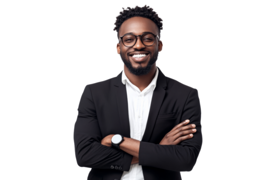 Confident young man in a professional suit smiling with arms crossed, showcasing a positive attitude in a corporate environment.
