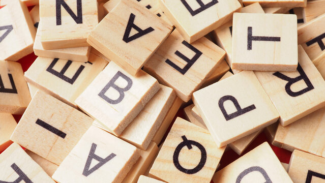 Wooden letter cubes is close up picture.