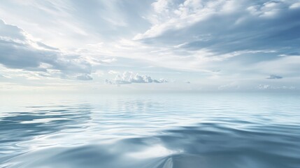 Obraz premium Calm ocean surface under a blue sky.