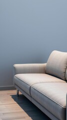 Naklejka premium Modern grey sofa with sleek design and clean lines, interior