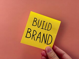 creating a new brand. a plan to create a brand. a banner for the presentation of a new brand. advertising for a new company. the inscription of the new brand on a paper background. paper background.