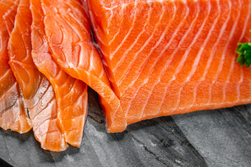 salmon raw fresh fish seafood fresh tasty food dish вelicious gourmet food background on the table...