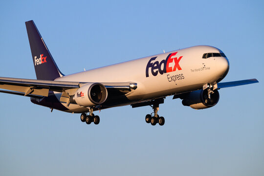 Everett, WA, USA - December 4, 2024; FedEx Express 767-300F cargo freighter aircraft evening landing registration N254FE