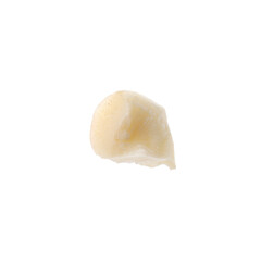 Piece of macadamia nut isolated on white