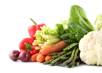 Many different ripe vegetables isolated on white