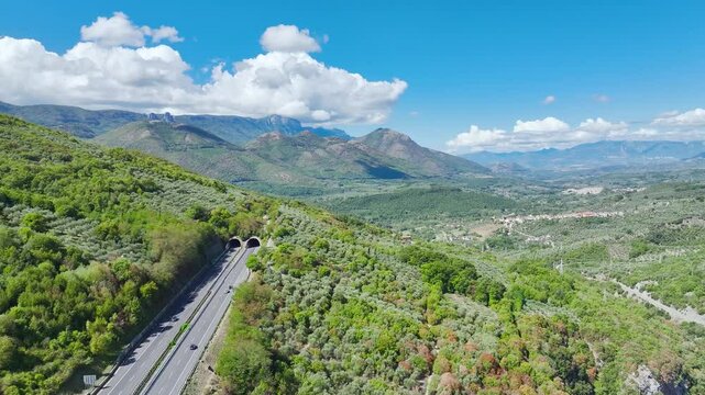View of Olive groves and fields from a drone over Road E45, Castrovillari, Cosenza, Calabria, Italy, Europe