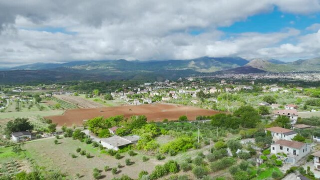 View of Olive groves and fields from a drone over Road E45, Castrovillari, Cosenza, Calabria, Italy, Europe