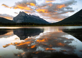 Cloud reflections over Canadian Rockies at sunrise Vermilion Lakes in Banff National Park, Alberta, Canada