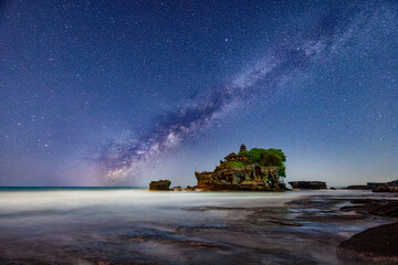 Tanah Lot temple, Bali, Indonesia, bright milky way over le temple at night