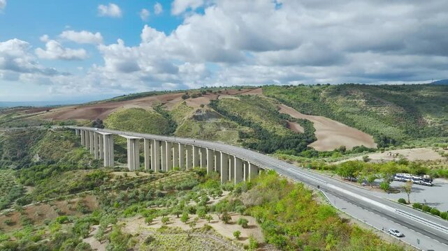 View of Olive groves and fields from a drone over Road E45, Castrovillari, Cosenza, Calabria, Italy, Europe