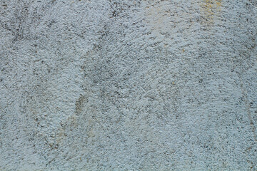 Obraz premium Close-up view of a textured gray concrete wall