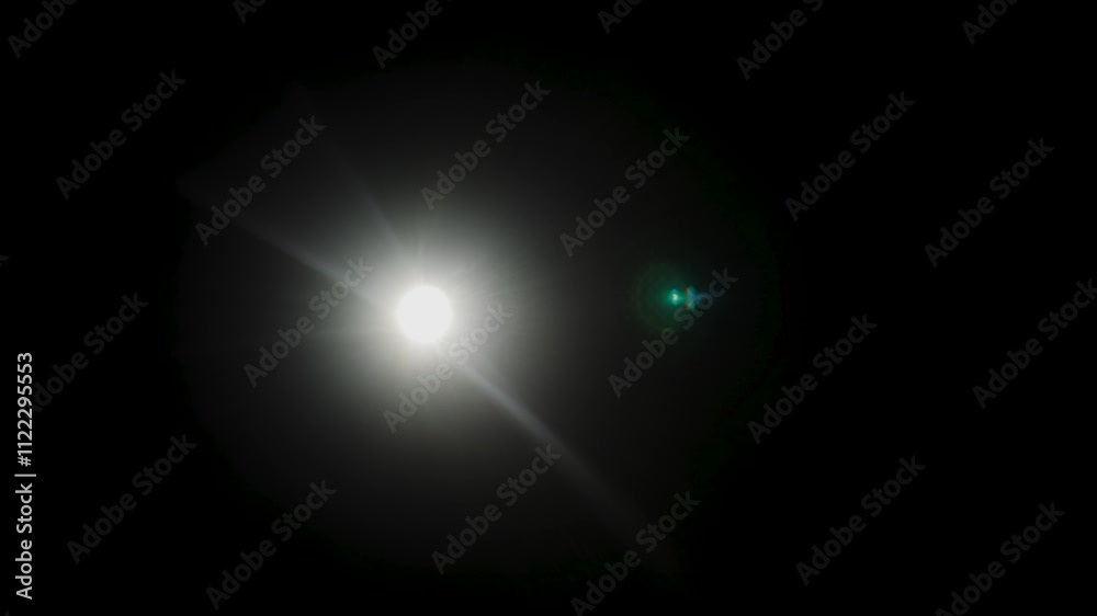 Poster Easy to add lens flare effects for overlay designs or screen blending mode to make high-quality images. Abstract sun burst, digital flare, iridescent glare over black background.