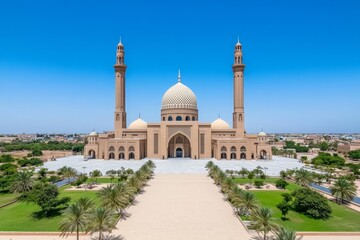 Fototapeta premium A high-angle view of the mosque showcasing the symmetry of its domes, minarets, and vast open courtyard