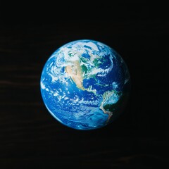Fototapeta premium Earth globe on dark background.