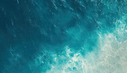 Fototapeta premium Aerial view of vibrant ocean waves and turquoise waters.