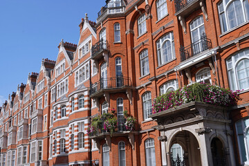 Front of elegant old apartment building in Mayfair district of London