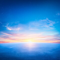 Fototapeta premium Vibrant sunset over calm ocean, blue sky, clouds.