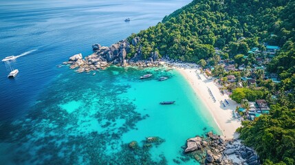 Naklejka premium Serene Tropical Beach with Clear Water and Lush Green Landscape