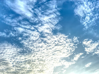 Beautiful Light clouds clear blue sky in sunshine day .