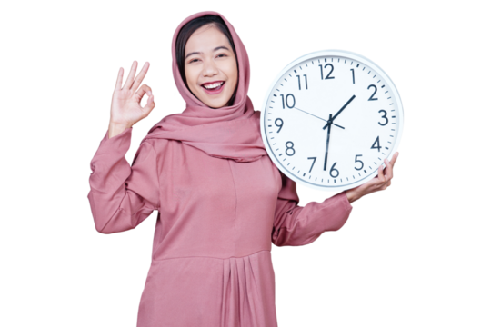 Asian Muslim woman holding alarm clock, waiting for Iftar time isolated transparent