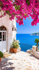 Fototapeta premium Bright bougainvillea blooms frame the balcony of a villa, offering stunning views of the calm Mediterranean Sea