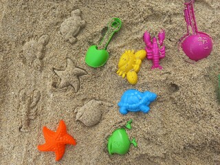 a set of toys for sand, kinetic sand