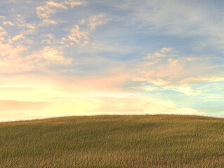 Fototapeta premium Vibrant sunset over rolling hills with lush green grass and a colorful sky