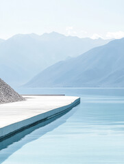 Calm waters reflect mountains in serene lakeside landscape during daytime