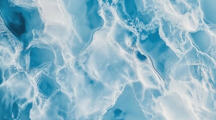 Obraz premium Close-up of rippled ice on a frozen river, with small air pockets and frosty textures creating a natural abstract pattern