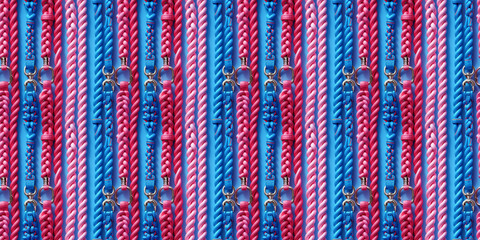 Fototapeta premium Vibrant blue and red rope pattern seamlessly interwoven with metal clips