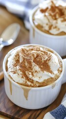 Creamy Hot Chocolate with Whipped Cream and Cinnamon Topping in White Mugs