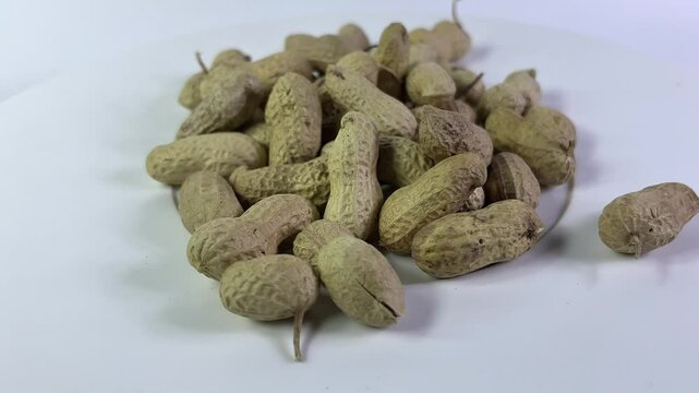 Raw Peanuts With Shells Isolated On White