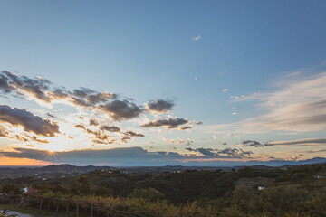 Colorful sunset in the vineyards at the border between Italy and Slovenia