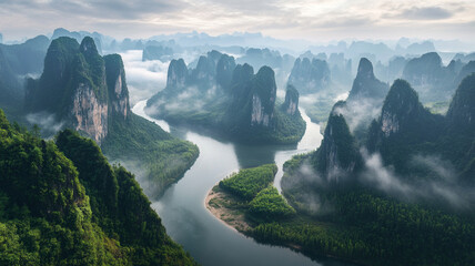 breathtaking view of winding river cutting through lush, misty valley surrounded by towering karst mountains under cloudy sky, evoking serenity and wonder