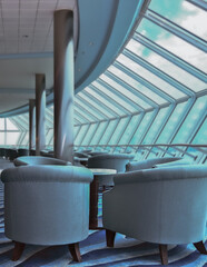 Luxurious elegant observation bar, lounge or coffee shop in cozy living room interior design with...
