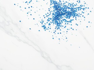 Obraz premium A collection of glinting blue particles scattered on a white marble surface, cosmic dust, sparkly surface, mineral fragments