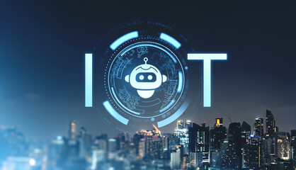 IoT concept with a glowing holographic robot icon over a futuristic city skyline at night.